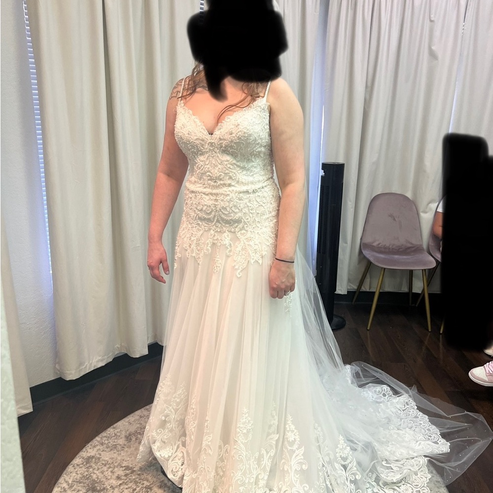 Wedding gown.  I found another one I love so I don’t need 2!